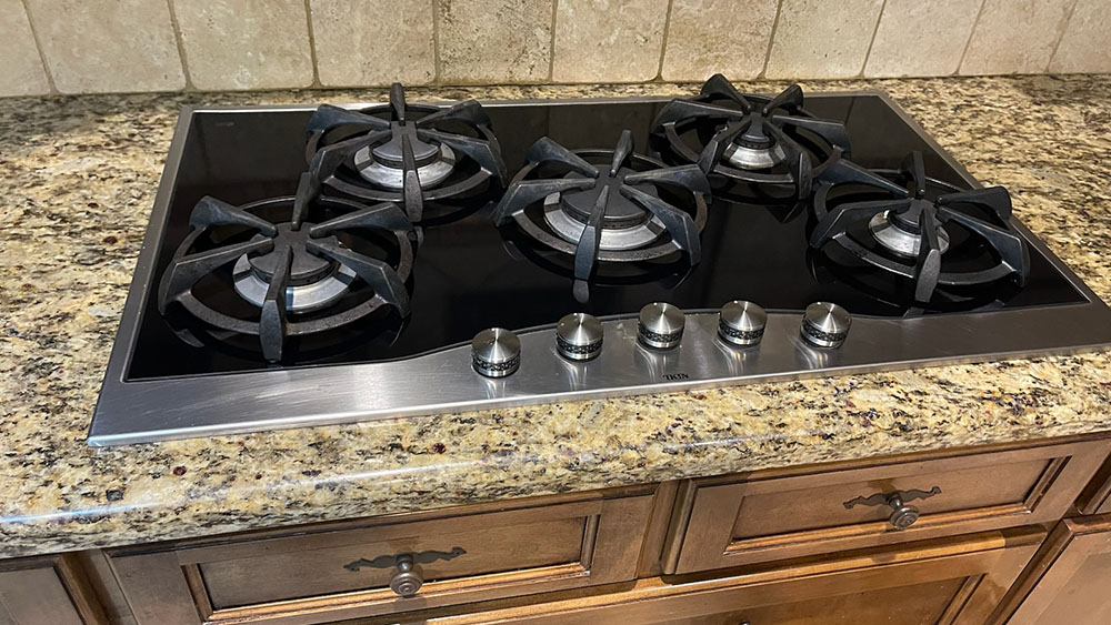 Clicking gas cook top